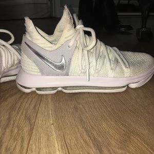 White KD’s. Only worn 4 times.